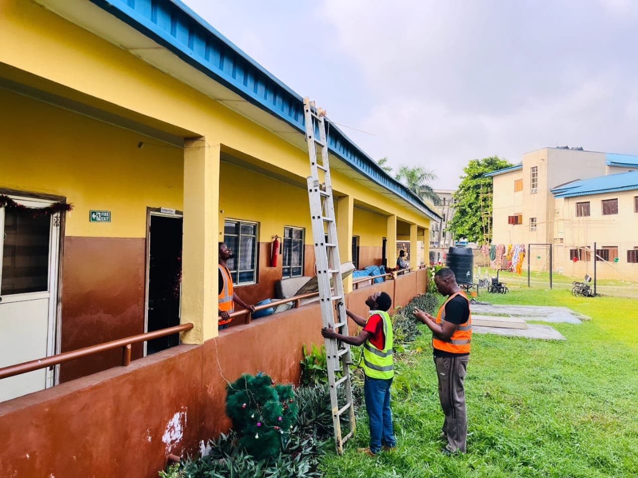 Quadloop installation team working at a community facility.